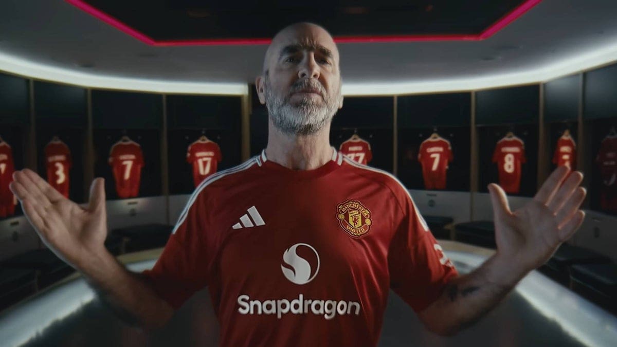 Featured image for Eric Cantona teams up with Manchester United to showcase latest Snapdragon shirts for 2024/25 season