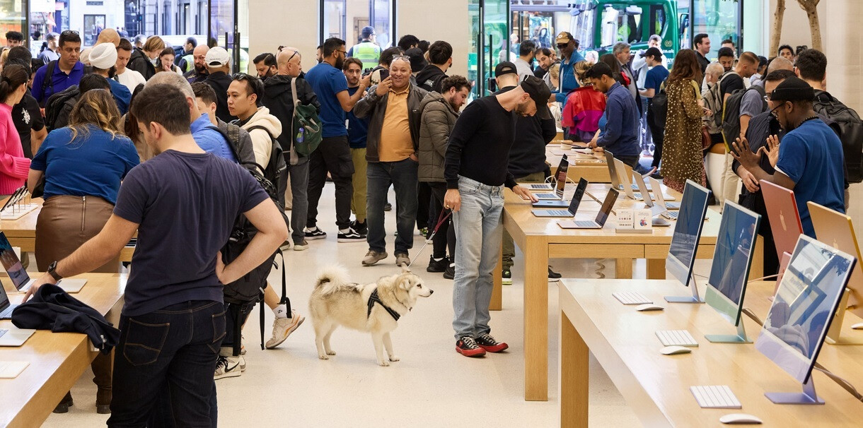 At the Regent Street store in London, man and his best friend check out the new devices - With the release of the iPhone 15 line and more, Apple Stores worldwide are packed with shoppers